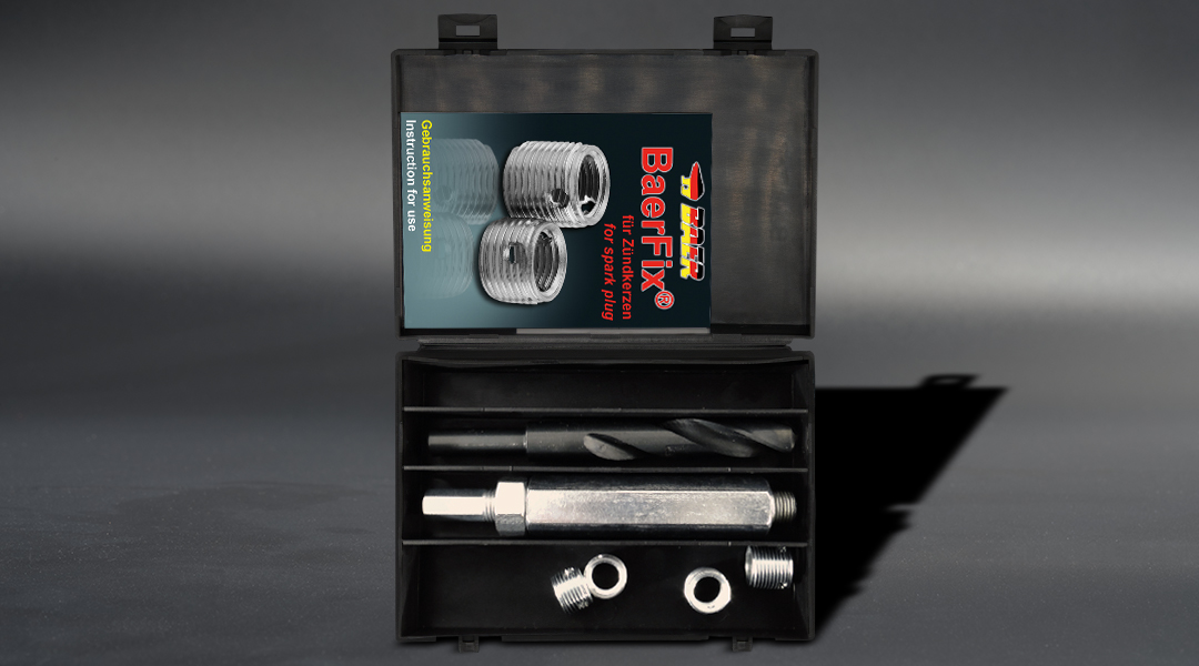Thread repair kit for spark plug threads from BaerFix in opened plastic box